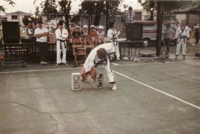 Master Knueppel breaks two bricks at a demonstration in Chicago, IL